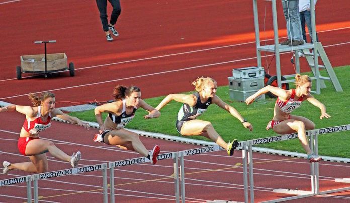 Women sprint hurdlers